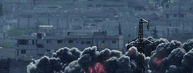 A huge cloud of smoke is seen following an American airstrike in the Syrian town of Kobane.