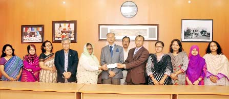 A new trust fund titled "Kabi Sufia Kamal Hall Scholarship Trust Fund"" has been set up at Dhaka University (DU). Provost of the Kabi Sufia Kamal Hall Prof. Dr. Nilufar Nahar handed over a cheque for Tk. 30 lac to DU Treasurer Prof. Dr. Md. Kamal Uddin"