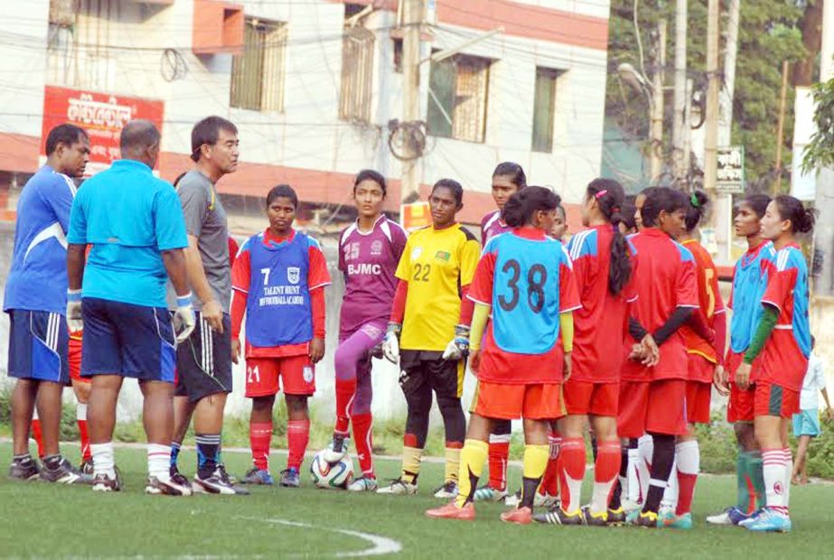 Members of Bangladesh National Women's Football team taking part at their practice session at the BFF Artificial Turf on Wednesday.
