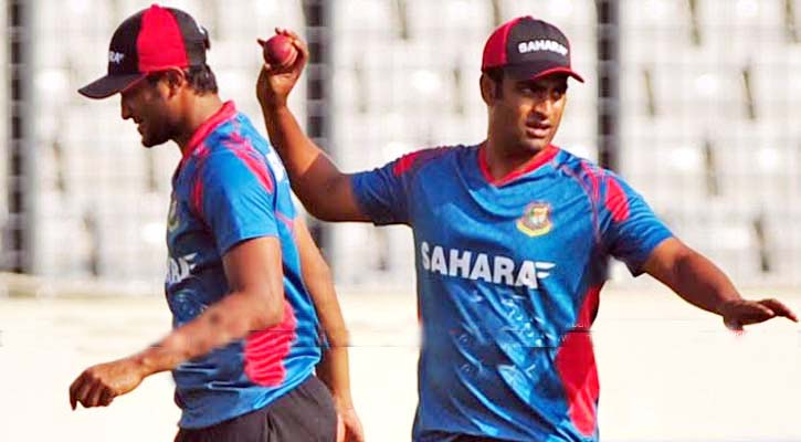 Tamim Iqbal (right) throwing the ball while Shakib Al Hasan busy with his practice during their practice session at the Sher-e-Bangla National Cricket Stadium in Mirpur on Wednesday.