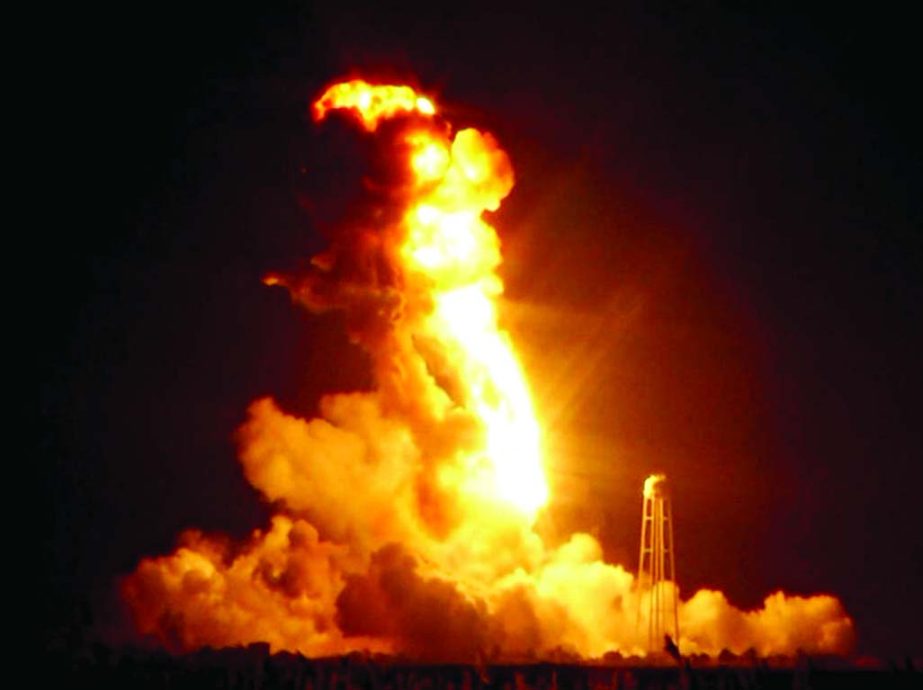This image taken from video provided by NASA TV shows Orbital Sciences Corp.'s unmanned rocket blowing up over the launch complex at Wallops Island, Va., just six seconds after liftoff. The company says no one was believed to be hurt and the damage appea
