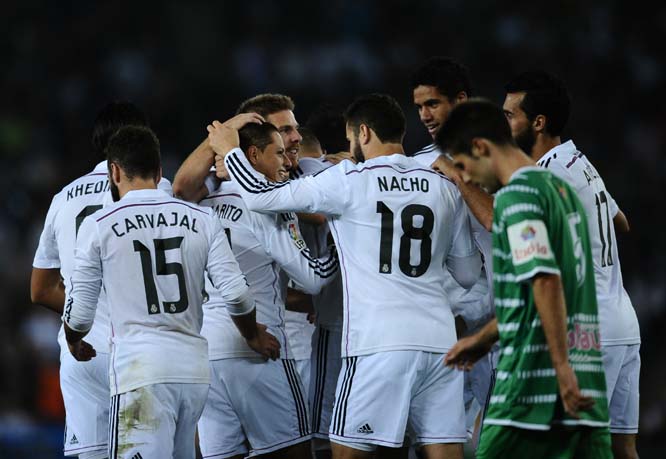 Real Madrid's Chicharito from Mexico (third left) reacts after scoring against Cornella during a Copa del Rey soccer match in Cornella Llobregat, Spain on Wednesday.