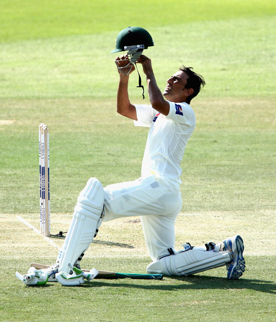 Younis Khan changes his helmet during a break on the 1st day of 2nd Test between Pakistan and Australia at Abu Dhabi on Thursday.