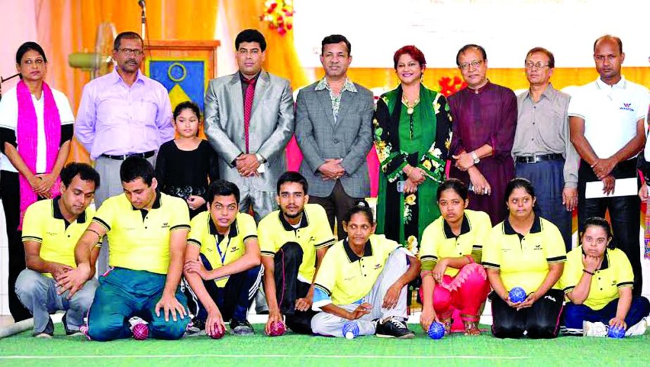 The participants of the Walton 1st Swid National Indoor Games with Additional Director of RB Group FM Iqbal Bin Anwar Dawn pose for a photo session at the SWID Alamgir MA Kabir Auditorium in New Eskaton Road on Friday.