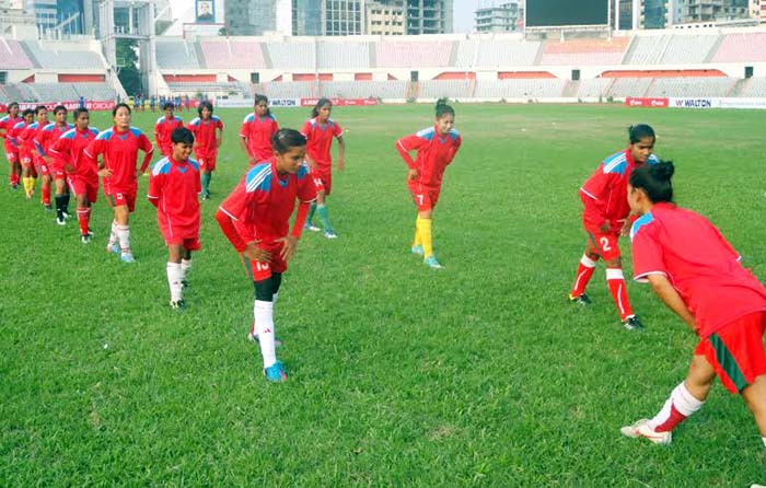 Players of Bangladesh National Women's Football team taking part at the practice session at the Bangabandhu National Stadium on Saturday.