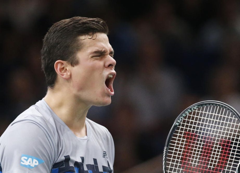 Milos Raonic of Canada celebrates his victory over Roger Federer of Switzerland during their quarterfinal match at the ATP World Tour Masters tennis tournament at Bercy stadium in Paris, France, Friday. Raonic won 7-6, 7-5.