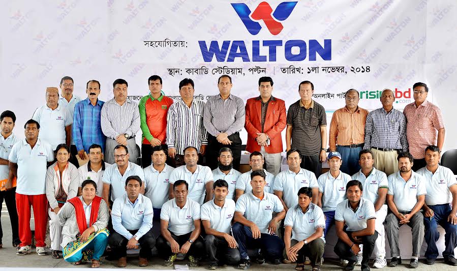 The participants of the kabaddi coaching course with the guests and officials of Bangladesh Kabaddi Federation pose for photograph at the Kabaddi Stadium on Saturday.