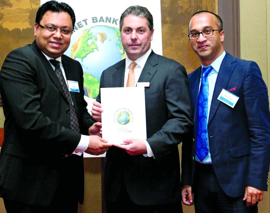 Rubel Aziz, Chairman and Mashrur Arefin, Deputy Managing Director of City Bank receiving 'Best Consumer Internet Bank in Bangladesh' award from Global Finance, a North America-based global financial publications, recently.