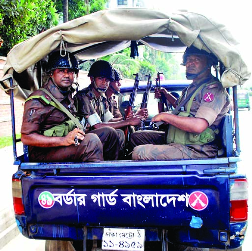 BGB members patrolling on the city streets centering hartal called by Jamaat-e-Islami and verdict against Jamaat leader and war criminal Mir Kashem Ali. The snap was taken from Mahakhali area on Sunday.