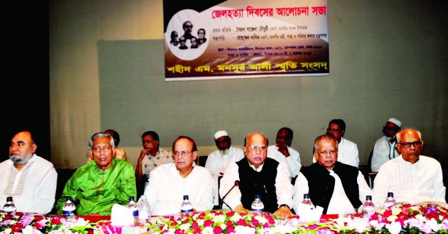 Health Minister Mohammad Nasim and Forest and Environment Minister Anwar Hossain Manju, among others, at a discussion on Jail Killing Day organized by Shaheed M Mansur Ali Smrity Sangsad at BMA Bhaban in the city on Sunday.