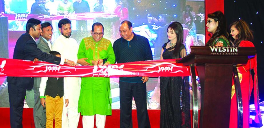 State Minister for Youth and Sports Biren Sikder MP, inaugurating Jams Autos launching programme by cutting ribbon at a city hotel recently. Abdus Sobhan, Chairman of Bashundhara Group, BARVIDA chairman Habib Ullah Dawn and Active Communication CEO, Niluf