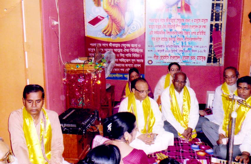 Justice Soumen Sarker along with other distinguished guests at a prayer meeting organized recently by Gita Renaissance Bangladesh at its temple in the city's West Kafrul .