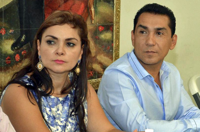 Jose Luis Abarca and his wife went on the run two days after the September 26 attack by police on the students [AP]