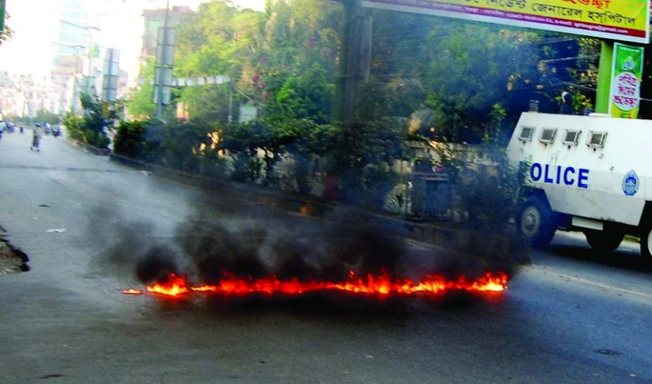 BOGRA: Shibir activists set on fire on the street at Kandar area in Bogra town by pouring petrol during yesterday's hartal.