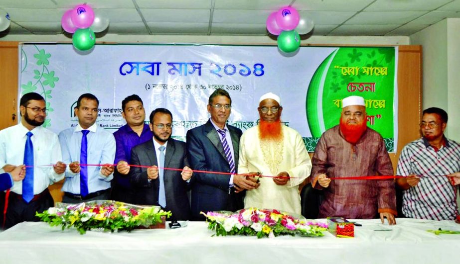 Abdul Malek Mollah, Director of Al-Arafah Islami Bank Limited, inaugurating campaign 'Meet the Clients' to celebrate service month 2014 of the bank at Jatrabari branch on Thursday. Jatrabari branch Manager Engr Md Idris Ali presided.