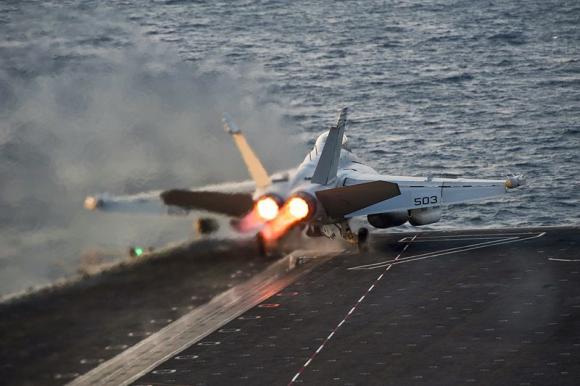 An EA-18G Growler launches from the Nimitz-class aircraft carrier USS Carl Vinson (CVN 70) in this U.S. Navy picture taken in the Arabian Gulf October 28, 2014.