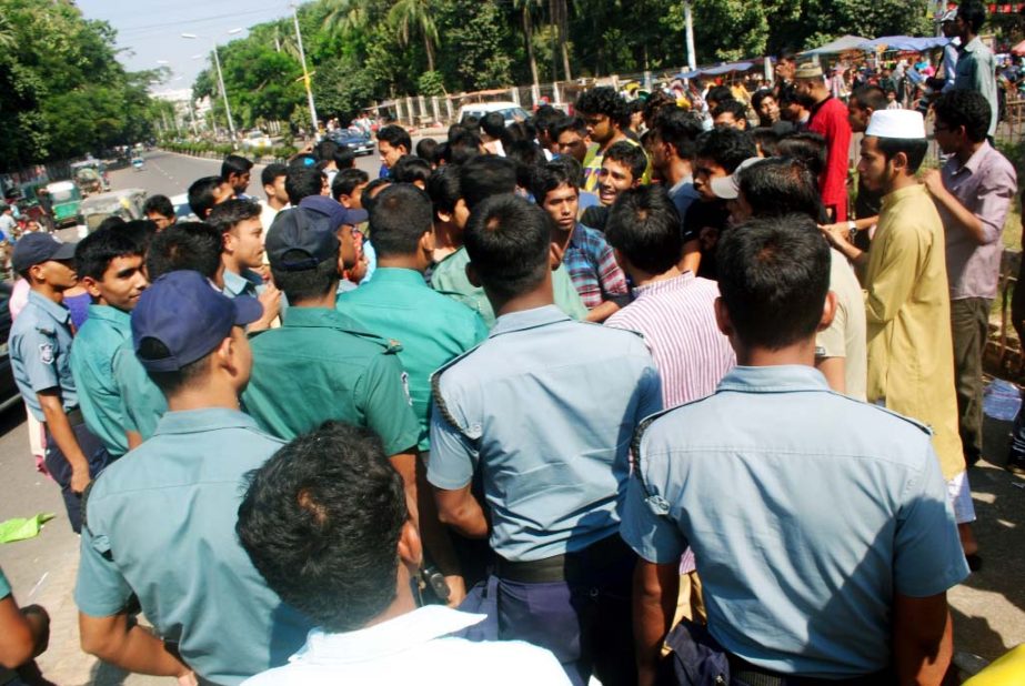 Law enforcers intercepted the procession brought out by Dhaka University (DU) admission seekers demanding second chance for admission. The snap was taken from TSC area on Friday.