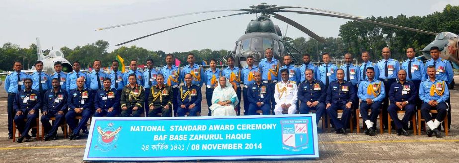 Prime Minister Sheikh Hasina attended a photo sesion with selected senior armed forces officers and airmen on the occasion of National Standard awarding ceremony to BAF Base Zahurul Haque yesterday in Chittagong.