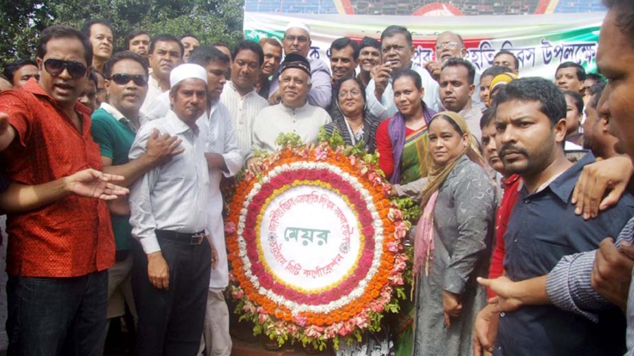CCC Mayor M Monzoor Alam placing wreaths at the Biplab Uddayan at Sholosahar in the city on the occasion of National Revolution and Solidarity Day yesterday.