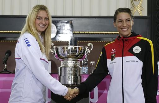 Czech Republic's Petra Kvitova (left) poses for a photo with Germany's Andrea Petkovic, (right) after a draw for the Fed Cup tennis Final between Czech Republic and Germany in Prague, Czech Republic on Friday.