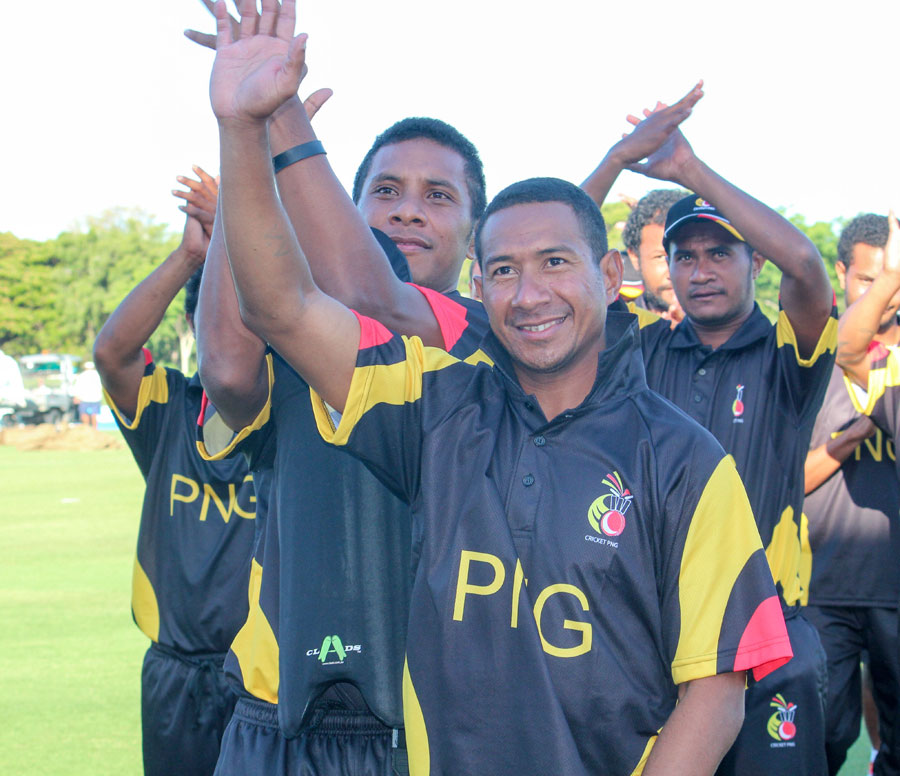 The Papua New Guinea players celebrate their four-wicket win against Hong Kong at Townsville on Saturday.