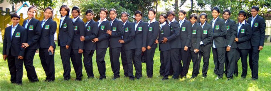 Pakistan bound players of Bangladesh women football team pose for photo in the city on Monday.