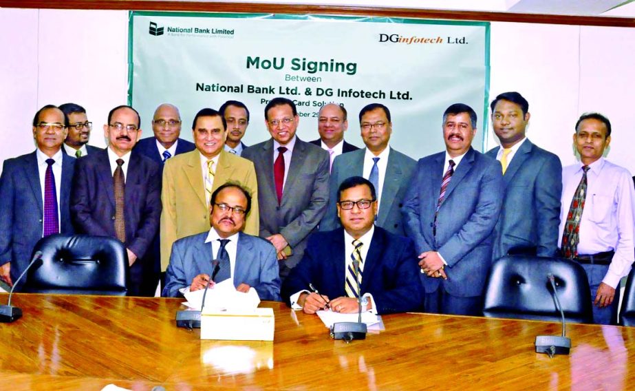 Hossain Akhtar Chowdhury, Executive Vice President of National Bank Limited and Shafquat Matin, Director of DG Infotech Limited, sign a Memorandum of Understanding to launch the prepaid card solution to unbanked customers at NBL head office recently.