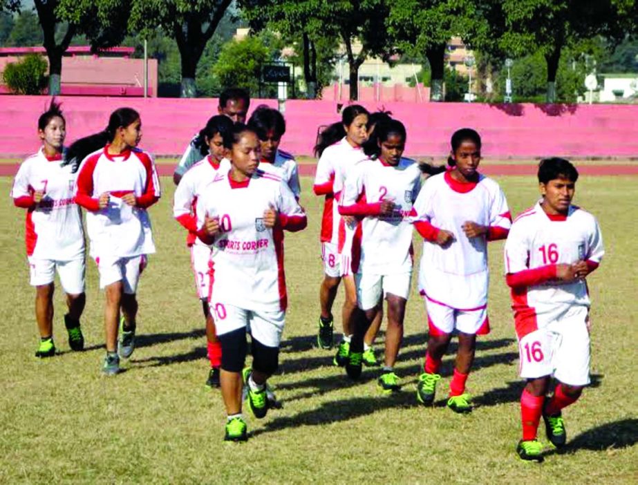 Members of Bangladesh National Women Football team during a practice session at Athletics ground of Jinnah Sports Complex, Pakistan on Friday. Bangladesh face defending champions India team at Islamabad, Pakistan today (Saturday).