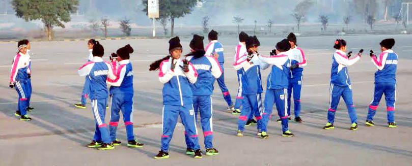 Players of Bangladesh National Women Football team warming up during a practice session at Athletics Ground of Jinnah Sports Complex, Pakistan on Tuesday.