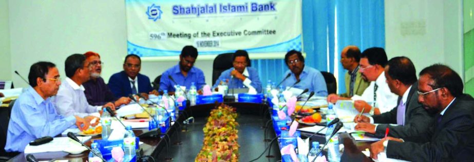 Akkasuddin Mollah, Chairman of the Executive Committee of Shahjalal Islami Bank Limited, presiding over 596th EC meeting at its head office recently. Farman R Chowdhury, Managing Director of the bank was present.
