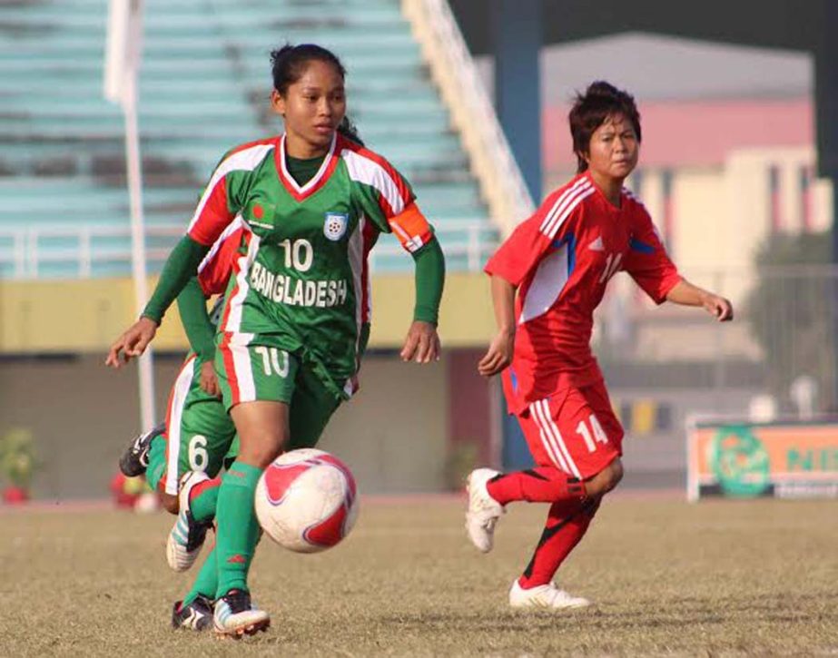 A scene from the match of the SAFF Women's Football Championship between Bangladesh National Women's Football team and Nepal National Women's Football team at Jinnah Football Stadium in Islamabad, Pakistan on Wednesday.