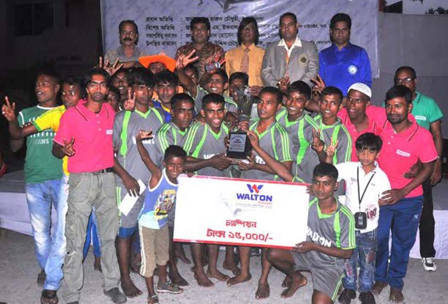 Members of Stadium Tokai team, the champions of the Walton Tokai Kabaddi Tournament and the guests and the officials of Bangladesh Kabaddi Federation pose for a photograph at the Kabaddi Stadium on Wednesday.