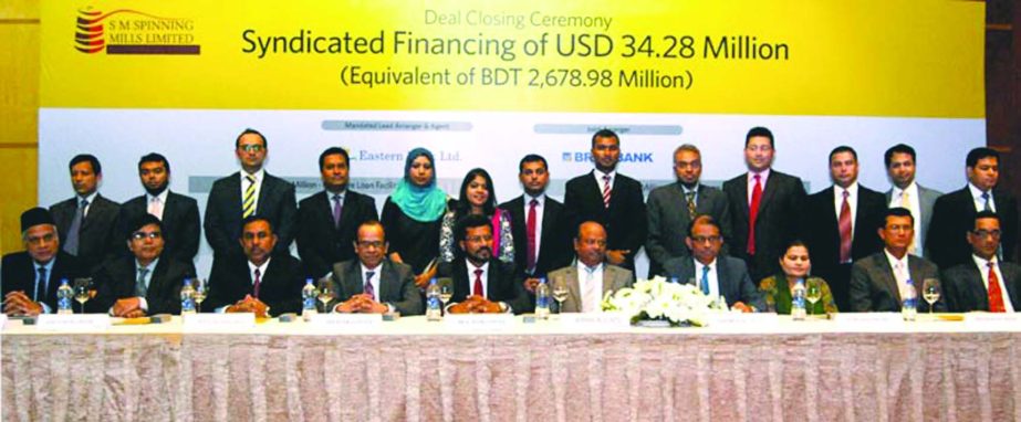 Eastern Bank Limited and BRAC Bank Limited sign syndication loan of Tk 2678.98m with SM Spinning Mills Limited at a city hotel on Thursday.