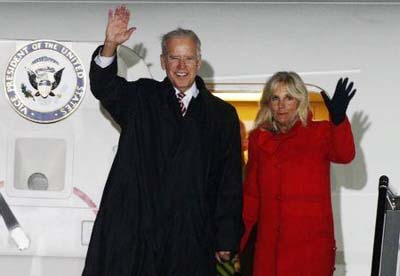 US Vice President Joe Biden (L) and his wife Jill wave upon their arrival at Boryspil International airport outside Kiev on Thursday.