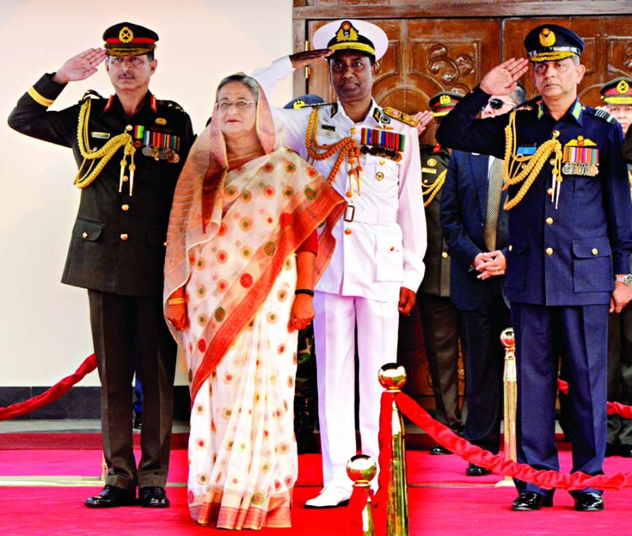 Prime Minister Sheikh Hasina witnessing the Armed Forces Day reception at the Sena Kunja on Friday. The Chiefs of three services seen saluting on the occasion.