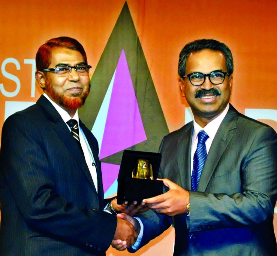 Abdus Sadeque Bhuiyan, Executive Vice President and Head of Development Wing of Islami Bank Bangladesh Limited, receiving 1st prize "Best Brand Award 2014" in bank category by Bangladesh Brand Forum at a city hotel on Saturday.