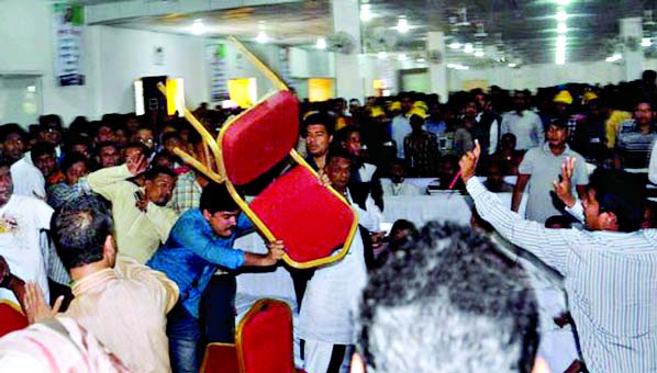 Two factions of Awami Juba League activists are seen fighting with chairs at the 42nd founding anniversary function of the organization in Chittagong on Sunday. Chairman Omar Faruque Chowdhury attended the function as chief guest.