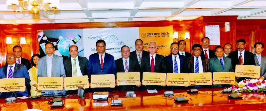 Helal Ahmed Chowdhury, Managing Director of Pubali Bank Ltd, launching "Pubali Cash", an inland remittance system, for unbanked people on Monday.