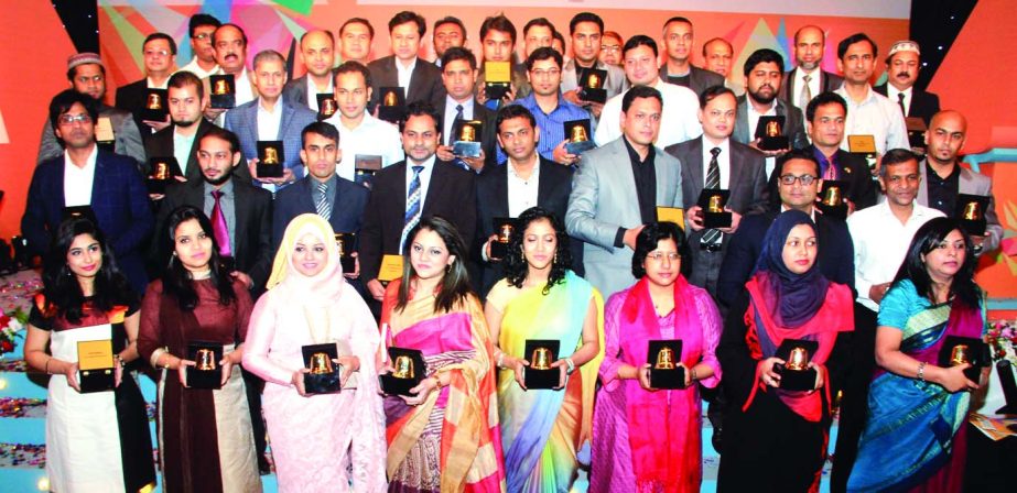 Best Brand Awardees pose with the crest organized by Bangladesh Brand Forum in partnership with Millward Brown, Bangladesh, a brand research company, at a city hotel on Saturday. Radhuni Masala placed the first position.