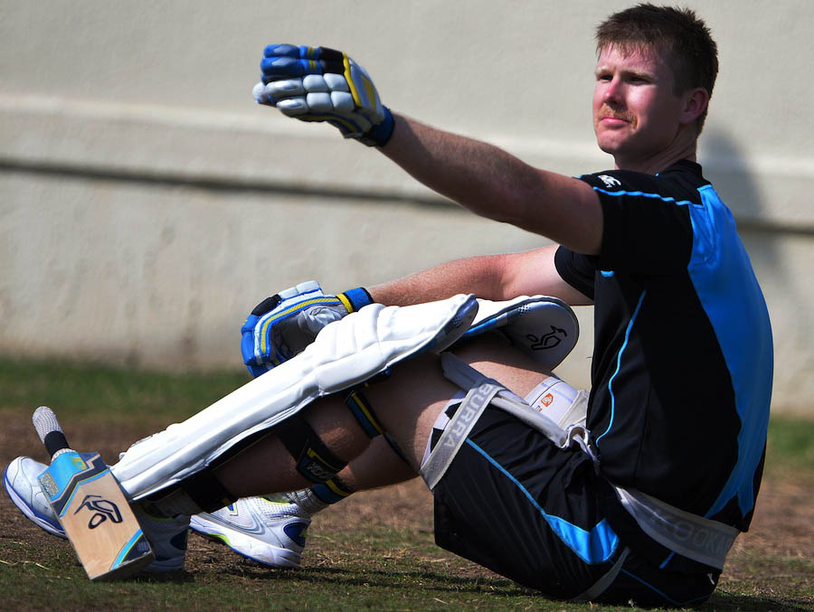 New Zealand cricketer Jimmy Neesham gestures as he waits to bat during a net practice session at the Sharjah cricket stadium on Monday. Rival captains Misbah-ul Haq and Brendon McCullum hope to win the toss and enjoy a kick-start to the series-deciding th