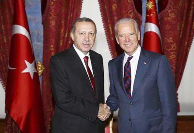 US Vice President Joe Biden Â® shakes hands with Turkey's President Tayyip Erdogan during their meeting at Beylerbeyi Palace in Istanbul.