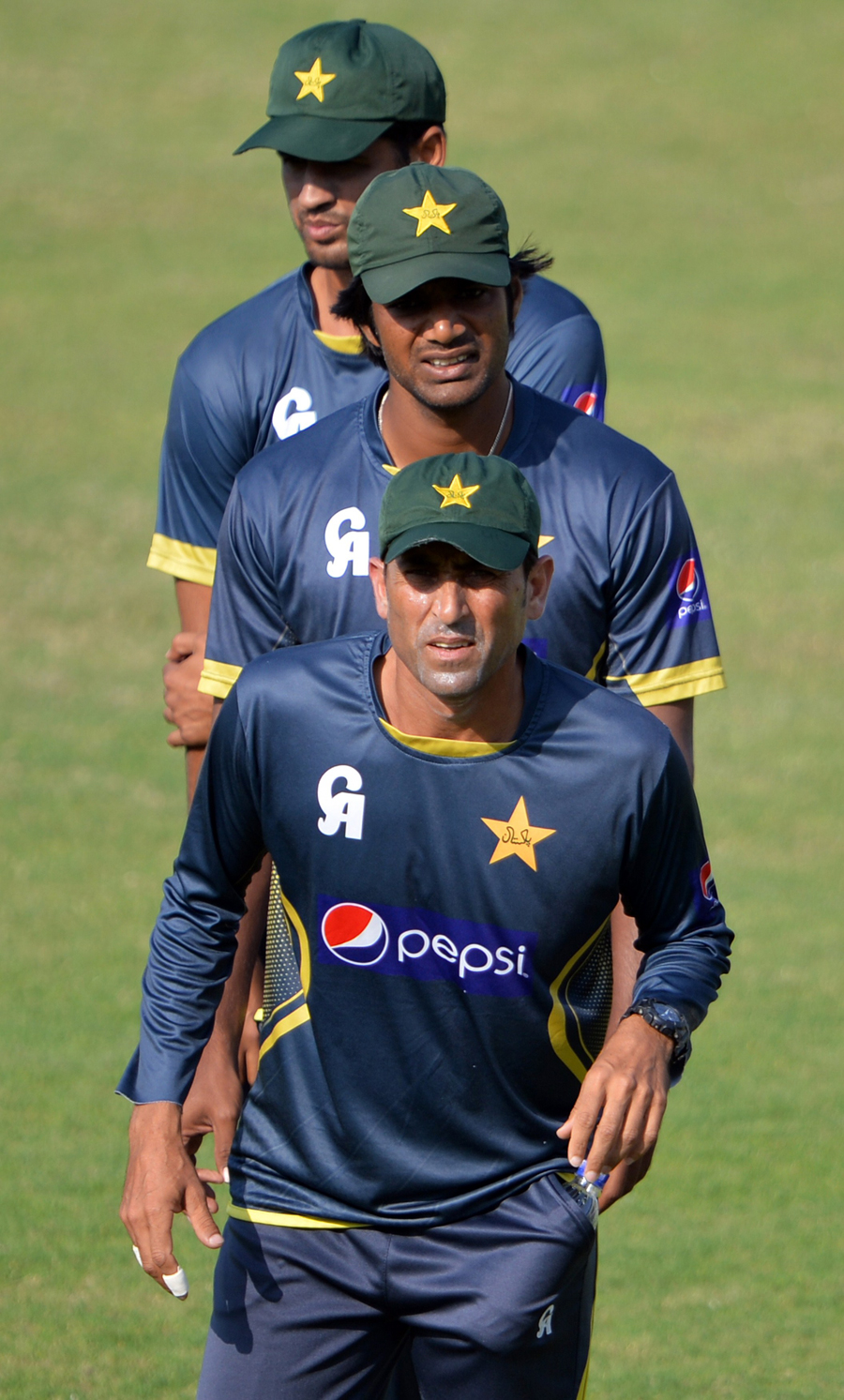 Pakistani players line up for a fielding drill during a practice session at Sharjah on Monday. Pakistan play New Zealand in 3rd Test from today.