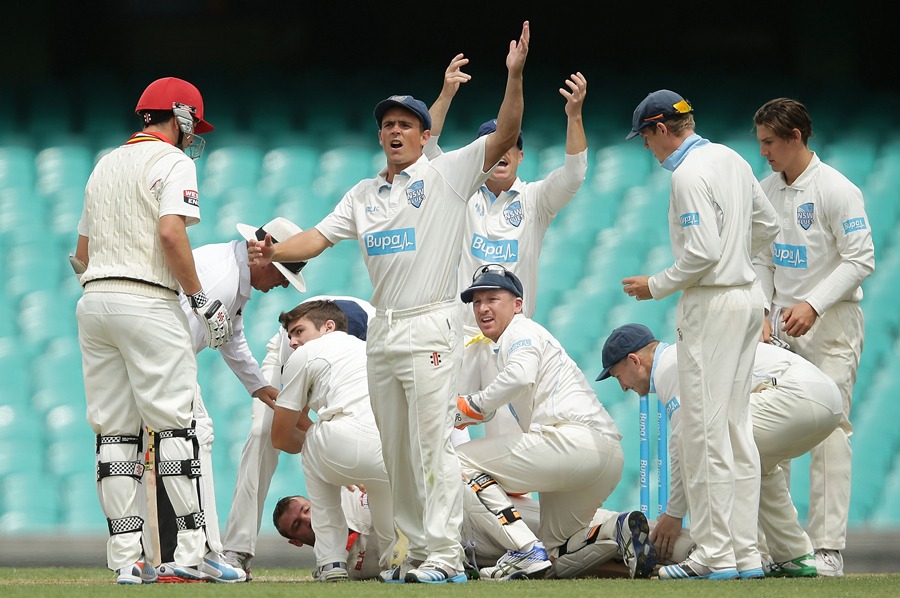 Calls for help go out after Phillip Hughes collapses on the 1st day of Sheffield Shield match between New South Wales and South Australia in Sydney on Tuesday.