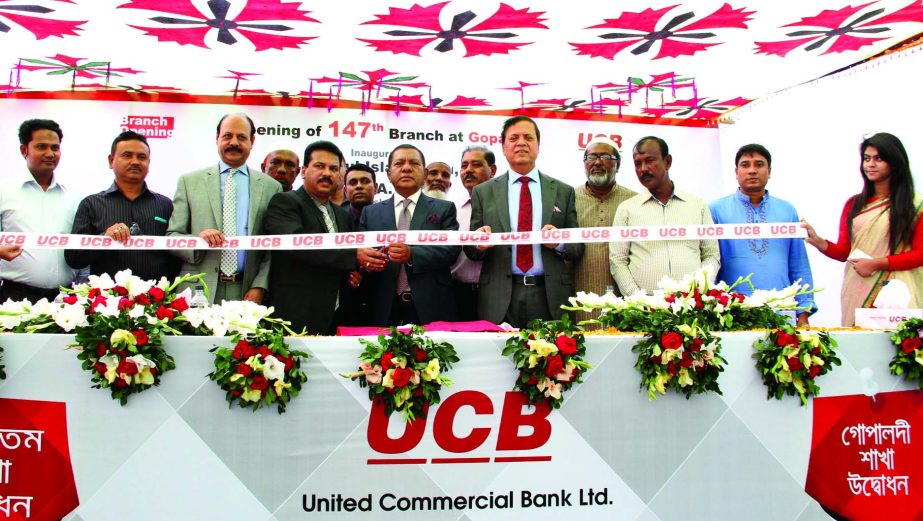 MA Sabur, Chairman of Risk Management Committee of United Commercial Bank Limited, inaugurating 147th branch at Gopaldi, Narayangonj on Monday. Muhammed Ali, Managing Director of the bank was present.