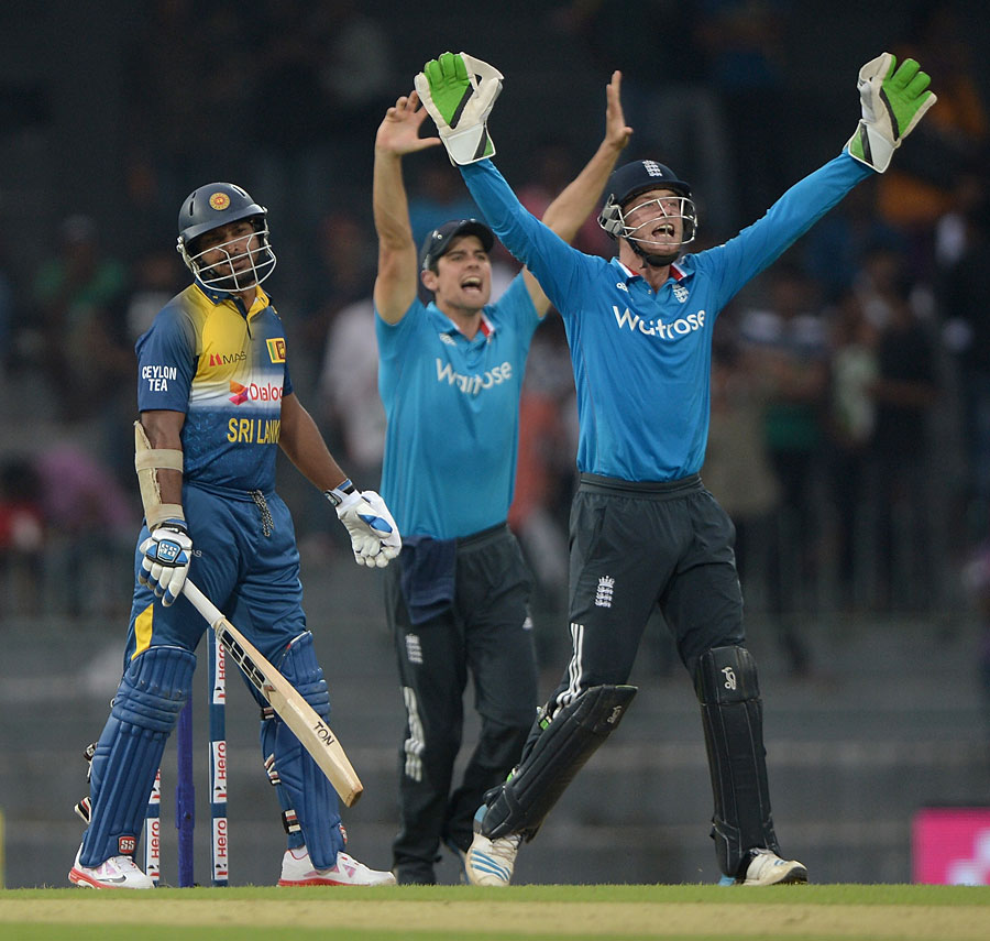 England successfully appeal for lbw against Kumar Sangakkara during the 1st ODI between Sri Lanka and England in Colombo on Wednesday. Sri Lanka scored 317 for 6 in their stipulated 50 overs.