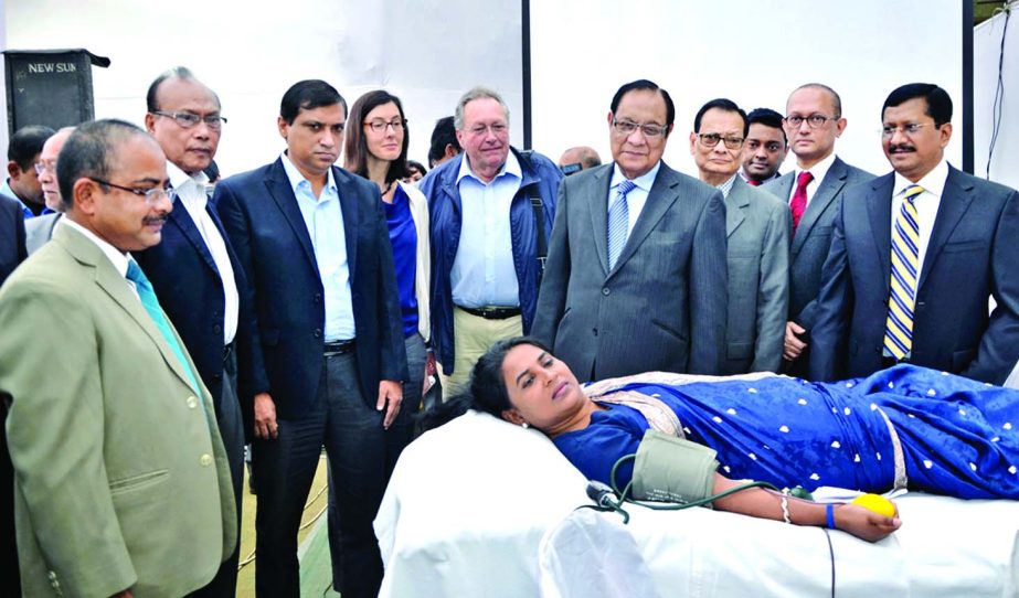 A Rouf Chowdhury, Chairman of Bank Asia Limited, inaugurating blood donation program at the proposed corporate office premises, Kawran Bazar in the city on Thursday to mark 15th anniversary of the bank.