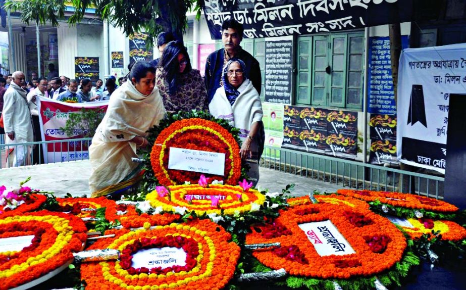 Families of Dr Shamsul Alam Khan Milon pay homage by placing wreath at the grave marking his death anniversary on Thursday.
