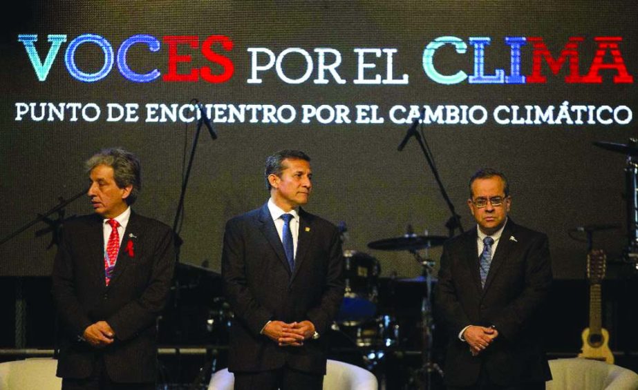 Peruvian Minister of the Environment and COP20 President Manuel Pulgar, left, Peruvian President Ollanta Humala, centre, and and Education Minister Jaime Saavedra attend a conference during the Climate Change Conference in Lima, Peru on Monday.