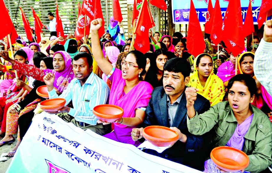 Common Thread Ltd of Harbist Group workers staged a sit-in programme for 2nd day on Tuesday organised by Jago Bangladesh Garments Sramik Federation in front of JPC demanding payment of their arrears with utensils in their hands.