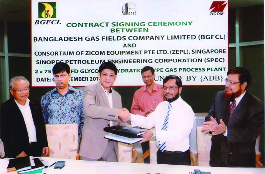 Eng Mostafa Kamal, Managing Director of Bangladesh Gas Field Company Limited and Rashed Chowdhury, Managing Director of Zicom Equipment Pte Limited sign a contract agreement for establishing two 75mmcf Process Plant at Titas Gas Field by Zicon recently.